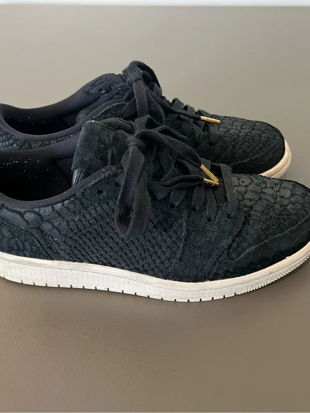 Jordan Women's Black Low-Top Sneakers with Gold Lace Aglets